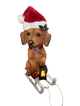 Grosse Dackelfigur auf Schlitten